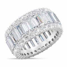 A stunning eternity ring sparkling with your birthstone!Lavishly plated with shimmering silver and over 50 dazzling simulated diamonds.Birthstone Beauty adds style and sophistication to any attire.A sumptuous, satin-lined presentation case is included at no additional charge - perfect for gift-giving and safekeeping. Luxury Half Eternity Ring With May Birthstone, Silver Baguette Cut Eternity Band Promise Ring, Baguette Cut Cubic Zirconia Channel Set Eternity Band, Cubic Zirconia Baguette Cut Channel Set Eternity Band, Cubic Zirconia Channel Set Eternity Band In Baguette Cut, Channel Set Baguette Cut Cubic Zirconia Eternity Band, Baguette Cut Cubic Zirconia Eternity Band For Anniversary, Silver Eternity Band With Halo For Promise, Promise Ring Cubic Zirconia Eternity Band With Halo