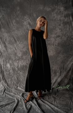 "This luxury exclusive cowl neck dress design is perfect as a oversize casual dress or maternity outfit. 100 % designed and handmade by Emsilk. I am pleased to offer your garments made to measure at no extra cost. All of my designs can be made in any colors that you see in my shop. * Details: - Boat neckline - Sleeveless - Invisible side pockets - Silk buttons key hole on the back - High quality silk 50% silk, 50% viscose - The model is 5'8\" tall and wearing size S. * Care: - Dry clean or hand Oversized Silk Elegant Dresses, Oversized Elegant Silk Dress, Black Sleeveless Maxi Dress For Loungewear, Black Sleeveless Silk Dress For Summer, Black Relaxed Fit Maxi Dress For Loungewear, Chic Black Maxi Dress For Loungewear, Chic Black Silk Summer Dress, Elegant Black Maxi Dress For Loungewear, Black Bias Cut Dress For Summer