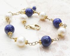 Natural Lapis Lazuli Bracelet, Real Pearls, Gold Filled, September Birthstone Birthday Gift, Royal B Elegant Blue Bracelets With Polished Beads, Elegant Pearl Bracelet With Gemstone Beads For Wedding, Elegant Sapphire Beaded Bracelets With Round Beads, Elegant Lapis Lazuli Jewelry For Anniversary, Elegant Blue Lapis Lazuli Bracelet, Elegant Sapphire Beaded Bracelets, Blue Pearl Bracelet With Gemstone Beads As A Gift, Blue Pearl Bracelet With Gemstone Beads For Gift, Elegant Lapis Lazuli Gemstone Bracelets