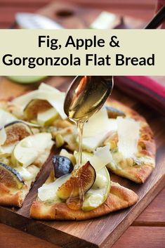 figs, apple and gorgonzola flat bread on a wooden cutting board