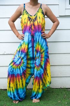 "💥One Size Fits Most Comfortable Tie Dye Hippie Jumpsuits Rompers Pants, Hippie Dress, Wide Legs Jumpsuits, Festival Clothings, Summer Clothing, Harem Dress, Beach Wear 👉One-of-a-kind hand dyed rompers 👉Fabric: 100% Soft and Breathable Rayon 👉Adjustable Tie shoulders 👉Boho/Hippie /Festival/Beach/Tropical/Fancy/UniqueTheme 👉Jumpsuit Length: 48\" 👉Straps Length: 19\" 👉Bust up to 55\" 👉Hip up to 60\" 👉 Tie Dye Method 👉The back is identical to front pattern 👉Flowy open legs 👉One Size Fi Multicolor Maxi Jumpsuits And Rompers For Summer, Beach Multicolor Maxi Jumpsuits And Rompers, Multicolor Maxi Length Jumpsuits And Rompers For Beach, Multicolor Maxi-length Jumpsuits And Rompers For Beach, Flowy Bohemian Jumpsuits And Rompers For Summer, Bohemian Maxi Jumpsuits And Rompers For Spring, Spring Bohemian Maxi Jumpsuits And Rompers, Bohemian Flowy Sleeveless Jumpsuits And Rompers, Spring Bohemian Maxi Length Jumpsuits And Rompers