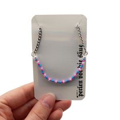 "Marsha" - trans* pearl necklace handmade Material: The chains and lobster clasps are made of stainless steel. The beads are made of plastic and are on an acrylic thread. --- ✔️ Shipment tracking ✔️ Neutral packaging Trendy Colorful Beads Chain Necklace Gift, Trendy Colorful Beaded Chain Necklace As Gift, Trendy Beaded Bracelet With Chain For Gift, Plastic Beaded Necklace With Round Beads, Pink Beaded Necklace Chain As Gift, Pink Beaded Necklace With Chain As Gift, Plastic Round Beads Necklace For Gift, Colorful Plastic Beads For Gifts, Trendy Beaded Necklaces With Pearl Chain For Gifts