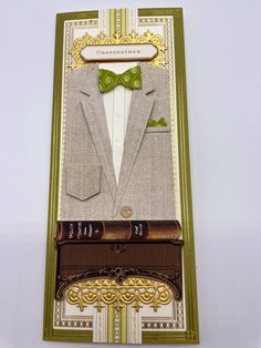 a card with a suit and bow tie on it