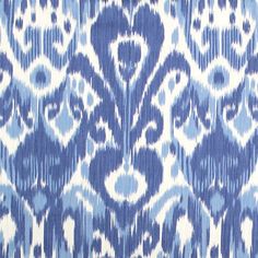 a blue and white pattern on fabric