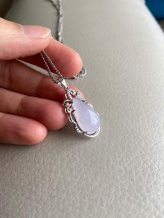 🌈 Water Drop Jadeite Jade Pendant, Light Lavender, S925 silver plate 🌷 Untreated Natural Jadeite/ Grade A Jade 🌷 Certified : YES 🌷 Jade from Myanmar/ Burma 🌷 100% handmade carving 🌷 Dimensions : ~18.6 x 10.6 x 8 mm 🌷 Color : Light Lavender 🌷 Including with S925 silver plate 🌷 The chain in the photos is for reference only, will not be included in the shipment 🌷 Free standard shipping from Hong Kong with tracking included 🌷 Take approximately 7-21 days to arrive worldwide ❤️ In Chinese Silver Drop Necklace With Gemstone Accents, Elegant Lavender Jewelry With Natural Stones, Elegant Jade Gemstones Natural Stones, Elegant Natural Jade Gemstones, Elegant Chalcedony Jewelry With Gemstone Accents, Elegant Chalcedony Jewelry With Natural Stones, Elegant Natural Chalcedony Gemstones, Elegant Silver Drop Gemstones, Elegant Silver Pendant Gemstones