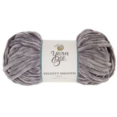 yarn ball in grey with white label