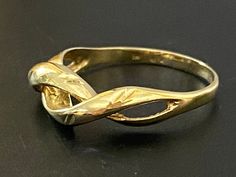 VINTAGE Ladies 10K Yellow Gold Twist Ring * Size 5.25 * Nice pre-owned vintage condition!  * It weighs 1.4 grams of solid 10K Gold! * Stamped 10k   Shipped in a gift box : ) Estate Yellow Gold 14k Gold Rings, Estate Yellow Gold Rings For Collectors, Estate 14k Yellow Gold Rings, Estate Style 14k Gold Rings, Estate Gold Ring As Gift, Gold Estate Rings For Formal Occasions, Gold Twist Ring, Black Opal Pendant, Locket Ring