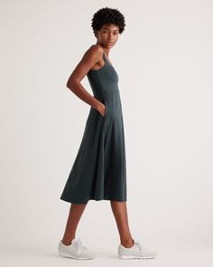 The definition of effortlessly cool, our fit and flare style is as easy to wear as it is fashionable. The midi length and pockets are designed to flatter every shape while the lightweight blend of recycled polyester and a touch of spandex feels buttery soft. Not to mention its moisture-wicking properties and 4-way stretch leave you feeling extra comfortable. Trust us, you’re going to want to wear this dress everywhere you go.  | Quince | Women's Flowknit Breeze Fit & Flare Dress in Heather Green Casual Midi Dress With Flattering Silhouette For Work, Relaxed Fit Midi Dress With Slip Pockets, Casual Fit And Flare Midi Dress, Casual Fit And Flare Mid-length Midi Dress, Spring Stretch Dresses With Side Pockets, Stretch Dresses With Side Pockets For Spring, Spring Dresses With Side Pockets And Stretch, Casual Fit And Flare Midi Dress For Fall, Fitted Midi Dress With Side Pockets