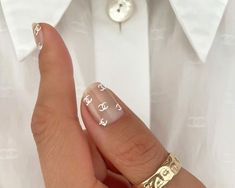 Logo Nails Are Our Latest Mani Obsession— And Now They'll Be Yours Too Logo Nail Art, White Summer Nails, Nail Guards, Logo Nail, Gold Nail Art, Gel Powder, Nude Nail Designs, Nail Ring, Chanel Logo