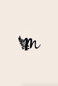 the letter m is made up of black letters and leaves on a white background,