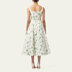 Carolina Herrera midi dress in an allover floral print features a self-tie sash bow detail at the waist  Scoop neckline Sleeveless Hem falls below the knee A-line silhouette Back zip closure Cotton/viscose/elastane Dry clean Made in USA Spring Sleeveless Midi Dress With Fitted Waist, Sleeveless Belted Dress For Garden Party, Belted Knee-length Midi Dress For Garden Party, Sleeveless Tie-waist Dress For Garden Party, Sleeveless Tie Waist Dress For Garden Party, Sleeveless Midi Dress With Tie Waist For Garden Party, Evening Flats, Cocktail Jacket, Sash Belts