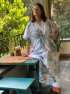 I made this Kaftan from a beautiful floral pattern in 100% mulmul cotton. Mulmul is a very fine variety of cotton which is extremely soft and it gets softer with every wash. It is so free flowing, that it will make you feel as if you aren't wearing anything at all ;) The beauty of the Kaftans is they will fit everyone so no need to worry about the size et all. All my Kaftans have deep necks(11-12 inches) so will fit all head sizes. However, the length of my kaftans will vary. I make all my kafta Cotton Sleepwear With Kimono Sleeves For Home, White Floral Print Kimono For Loungewear, Cotton Kimono With Kimono Sleeves For Sleep, White Printed Kimono For Loungewear, Summer Cotton Sleep Kimono, Cotton Sleep Kimono With Kimono Sleeves, White Kimono Sleeve Sleepwear For Home, Summer Home Sleepwear With Kimono Sleeves, Summer Sleepwear With Kimono Sleeves For Home