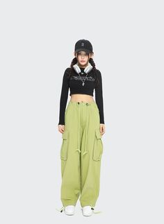 Elevate your fashion with our Acubi Wide Leg Cargo Track Pants. Featuring a relaxed fit, drawstring waist, and functional pockets, these Y2K-inspired streetwear essentials combine comfort and style for a cool and collected look. Trendy Green Parachute Pants With Multiple Pockets, Green Baggy Wide-leg Cargo Pants, Sporty Green Wide Leg Cargo Pants, Green Wide-leg Utility Cargo Pants, Green Wide-leg Casual Cargo Pants, Utility Full Length Cargo Style Sweatpants, Spring Full-length Cargo Pants With Drawstring, Casual Green Cargo Pants With Drawstring, Casual Green Cargo Parachute Pants