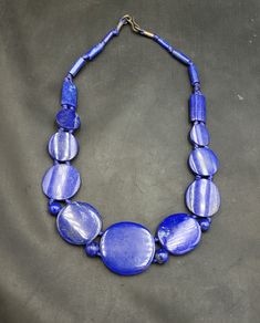 It's very high Quality of Lapis lazuli Stone From Afghanistan Its Handmade Carved Beautiful Beads Necklace  Stone Lapis lazuli Stone  Length 50Cm Artisan Blue Wooden Beads, Elegant Blue Jewelry With Wooden Beads, Blue Lapis Lazuli Beaded Necklaces, Blue Lapis Lazuli Jewelry With Large Beads, Blue Lapis Lazuli Necklace With Large Beads, Traditional Blue Jewelry With Wooden Beads, Artisan Blue Faceted Beads, Traditional Blue Lapis Lazuli Necklace, Polished Blue Lapis Lazuli Beads