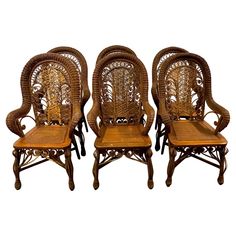 three wicker chairs sitting next to each other