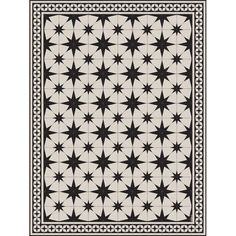 a black and white rug with an intricate design