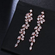 Material: silver and zirconia/crystals For silver set Glamorous Rose Gold Cubic Zirconia Chandelier Earrings, Elegant Party Jewelry Sets With Plating, Elegant Plated Jewelry Sets For Party, Rose Gold Crystal Earrings For Party, Glamorous Rose Gold Crystal Earrings With Cubic Zirconia, Rose Gold Cubic Zirconia Bridal Earrings For Evening, Glamorous Rose Gold Cubic Zirconia Crystal Earrings, Rose Gold Bridal Earrings With Sparkling Cubic Zirconia, Fine Jewelry Crystal Earrings With Cubic Zirconia For Party