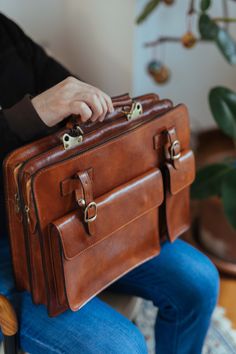 Our company's artisans combine old world craft methods with modern function, thus creating a non-bulky European design that's perfect for today's professional on the go. The rich character of these luxury products will age beautifully and develop into a better version than when first purchased. Briefcases for men are more than an accessory. A leather briefcase bag is an extension of who you are and what you believe in. When we craft leather briefcase bags for men, they are designed to securely h Luxury Designer Monogram Canvas Briefcase, Suitcase Ideas, Mens Briefcase, Rich Character, Leather Business Bag, Birthday Doodle, Sewing Easy, Leather Briefcase Bag, Vintage Leather Handbag