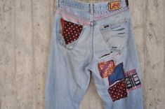 "Ready to send:Size-LEE size 32,33,34 Unique vintage jeans with apcycled patches. One of a kind.. Hand made embroidery and unique painting .... ---Or---- Made to order, in any size, within 14 working days . If you need different size, please send me a message and I will make you a special and unique design within 14 working days. They are all different! No one will have the same one as you have! Hand painted, one of kind jeans. You pick your size, model (slime- boyfriend- high waist- low waist) Casual Medium Wash Upcycled Jeans, Upcycled Fitted Casual Jeans, Casual Fitted Upcycled Jeans, Fitted Casual Upcycled Jeans, Retro Reworked Jeans For Summer, Retro Reworked Summer Jeans, Redone Jeans, Vintage Levi Shorts, Patched Denim Jeans