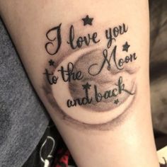 i love you to the moon and back tattoo design on arm with stars in background