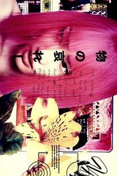 a woman with pink hair and flowers in front of her face, surrounded by books