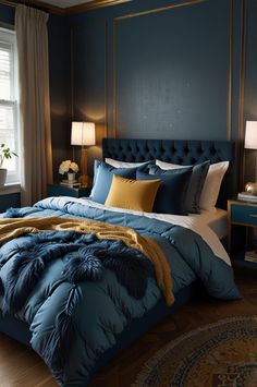 a bed with blue comforter and pillows in a bedroom