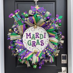 a mardi gras wreath on the front door