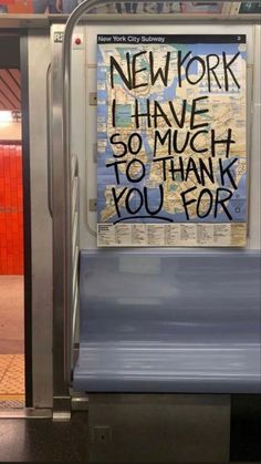 a subway station with a sign on the door that says new york i have so much to thank you for