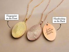 Fingerprint & Handwriting Necklace If you love someone and want them with you always, this fingerprint necklace is the perfect jewelry piece for you. It is also a thoughtful and sentimental gift to honor a beloved family member or friend who has passed away or to commemorate someone special in your life. It can be personalized with just a photo of your loved one's fingerprint. It can be further customized with your loved ones' handwriting on the back. Materials & Details Premium 925 Silver: 92.5 Thumbprint Necklace, Fingerprint Necklace, Handwriting Necklace, Fingerprint Jewelry, Love Someone, If You Love Someone, Memorial Necklace, Silver Engraving, Sentimental Gifts