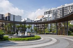 a circular courtyard with fountains in the middle