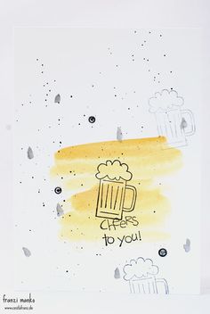 a card with watercolors and ink that says cheers to you