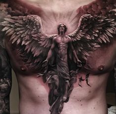 a man with angel tattoos on his chest