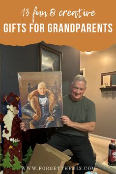 a man sitting on the floor holding up a painting with text overlay that reads, 13 fun & creative gifts for grandparents