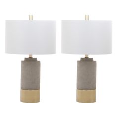 two grey and gold table lamps with white shades