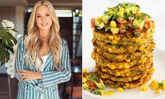 a woman standing next to a stack of food