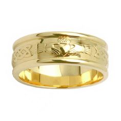 a gold ring with an image of a frog on the front and two hearts in the middle