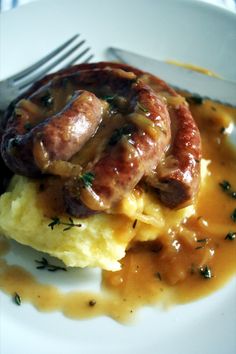 Bangers, Mash and Onion Gravy Mustard Gravy Recipe, Bangers And Mash Recipe, Bangers And Mash, Potato Ricer, Homemade Gravy, Onion Gravy, Cooked Carrots, Mood Food