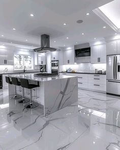 a large kitchen with marble floors and white cabinets is pictured in this black and white photo