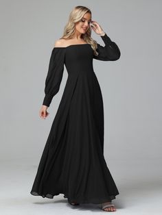 a woman wearing a long black dress