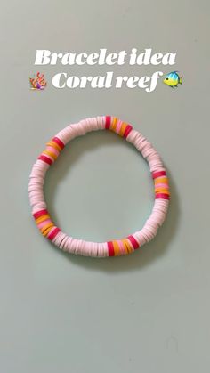 the bracelet is made with pink, orange and yellow beads on a gray background that says bracelet idea coral reef