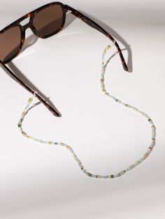 Keep your sunglasses right where you want them this summer with our Seaside Beaded Sunglasses Chain. Not only is this sunglasses chain functional, but it also matches all of your favorite beaded jewelry. Complete your sunglasses collection with all of our eyewear essentials. Beaded Sunglasses Chain, Beaded Sunglasses, Sunglasses Chain, Sunglass Chain, Sunglasses Collection, Jewelry Cleaner, Cleaning Jewelry, This Summer, Beaded Jewelry