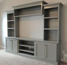 the entertainment center is on sale for $ 549 00 and has been painted gray