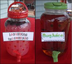 two jars filled with liquid sitting on top of a red tablecloth covered table next to each other