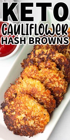 keto cauliflower hash browns on a white plate with ketchup in the background