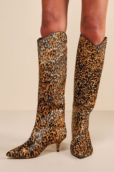 You'll make an iconic statement every time you style the Schutz Maryana Lo Casual Natural Calf Hair Leather Knee-High Boots! Sleek, genuine calf hair leather (with a tan and black leopard print throughout) shapes a pointed-toe upper and a 15"" knee-high shaft with a 14.75"" circumference. The simple slip-on design makes for easy styling, while a classy kitten heel completes the stylish look! 2. 25" wrapped kitten heel. Cushioned insole. Rubber sole has nonskid markings. Genuine leather upper and lining. Balance man made materials. Imported. Lulus | Maryana Lo Casual Natural Calf Hair Leather Knee-High High Heel Boots | Size 6. Kitten Heel Boots, Leopard Print Boots, Print Boots, Lulu Fashion, Black Leopard Print, Knee High Leather Boots, Black Leopard, Fall Shoes, Shoe Print