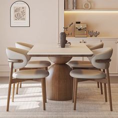 a dining room table with chairs around it