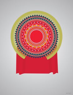 a red table cloth with a circular design on it and a yellow border around the edge