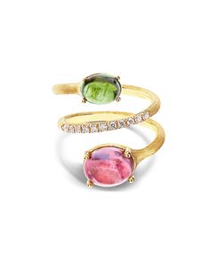 An ode to elegance that forces the rules, which rewrites shapes and details with refinement. A luminous rivière of diamonds that embraces an 18kt yellow gold spiral and culminates in two wonderful tourmalines, one pink and one green. A sinuous and sparkling dance to wear.DIAMONDS:- Weight (total): 0.15 CT- Clarity: VS- Spiral Jewelry, Spiral Ring, Tourmaline Jewelry, Italian Jewelry, Green A, 18k Gold Ring, October Birthstone, Stunning Jewellery, Green Tourmaline