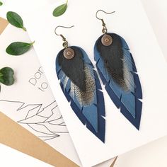 Dark Blue  Leather Earrings  -  Feather Earrings -   Leather Feather - Long Earrings -  Boho Earrings - Boho Jewelry - Handmade Leather Jewelry -  Dangle Earrings Long, dangle, bohemian feather earrings made with blue leather. Materials: leather, feather, brass Color: Dark blue, blue, black,bronze Drop Length: 9 cm (3,5") Drop Width: 3,5 cm (1,37") *Made with 100% genuine leather *Handmade (hand cut) *Dreamy Boho chic Dare to DREAM! It is a great gift for women that your mom, girlfriend, or sist Dark Blue Earrings, Diy Earrings Easy, Denim Earrings, Earrings Feather, Great Gifts For Women, Earrings Boho, Feather Earrings, Blue Earrings