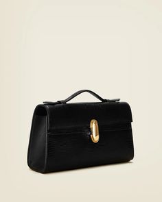 Symmetry Pochette – Savette Savette Bag, Savette Symmetry Pochette, Parallel And Perpendicular Lines, Fancy Bags, Elegant Style, Leather Handle, Pouch, Pure Products, Leather